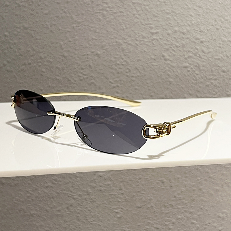 Oval formalı metal çərçivəsiz qadın gün eynəyi, küçə üslubu