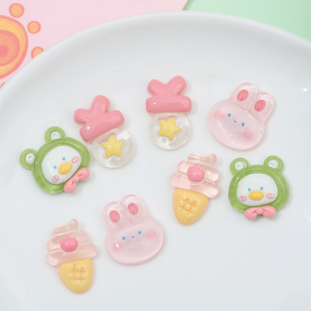 Rosa de dibujos animados conejo congelado DIY accesorios de resina crema pegamento caja del teléfono accesorios para el cabello clip de oído material de parche al por mayor