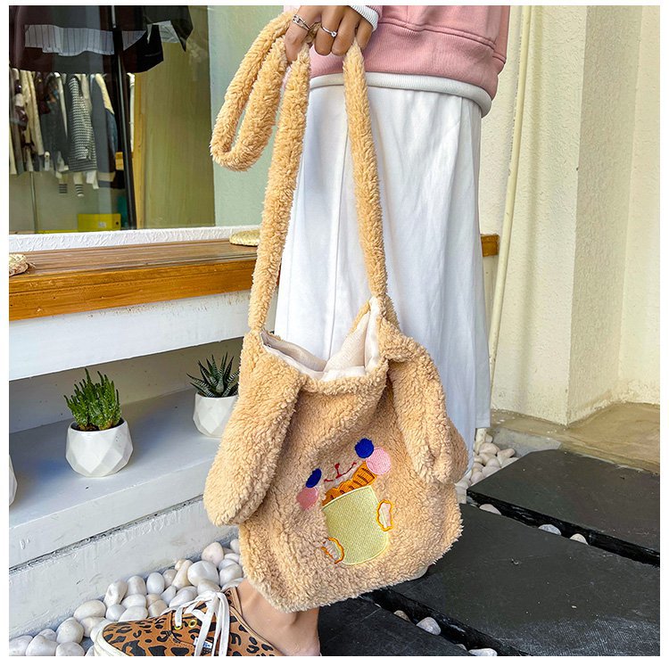 This autumn and winter hand-held bag with big ears, cute animal-embroidered fur, and a simple lambskin large-capacity student backpack undefined