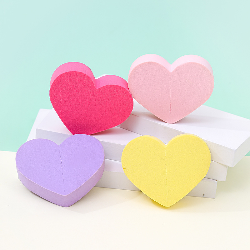 Fábrica personalizada de polvo en forma de corazón almohadilla de aire de amor de桃ar herramientas de maquillaje de doble cara esponja de huevo de maquillaje no comer polvo