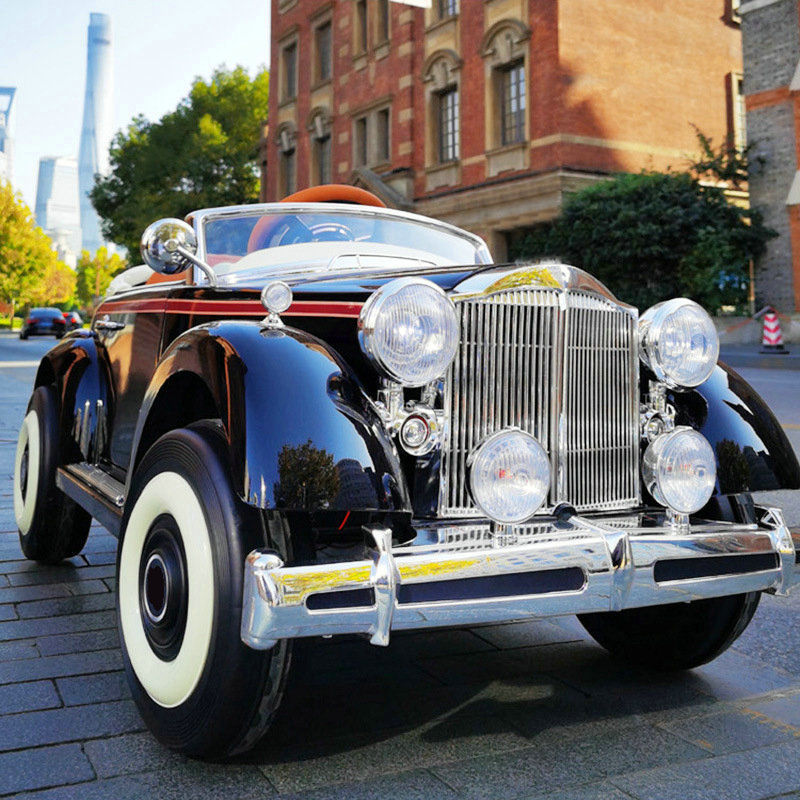 Coche eléctrico para niños El coche clásico de control remoto para bebés macho y hembra puede sentarse en las cuatro ruedas con tracción en las cuatro ruedas, coche de juguete oscilante recargable