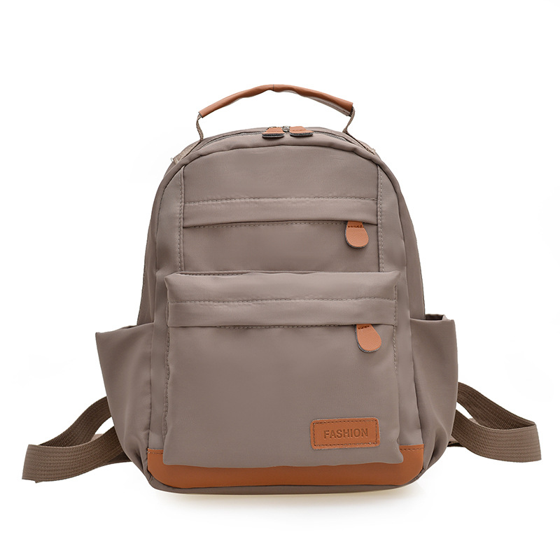 2025 primavera nueva mochila simple de color sólido mochila de estudiantes de escuela primaria mochila de viaje al aire libre