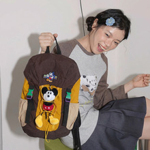可爱毛绒米奇双肩包女学生休闲背包卡通玩偶装饰多色拼接书包