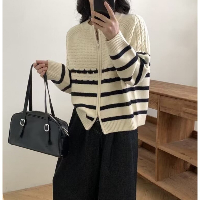 2025 otoño y invierno nuevo color contrastante rayas de doble cremallera cardigan de punto de mujer versión coreana universal suéter de manga corta larga suelta