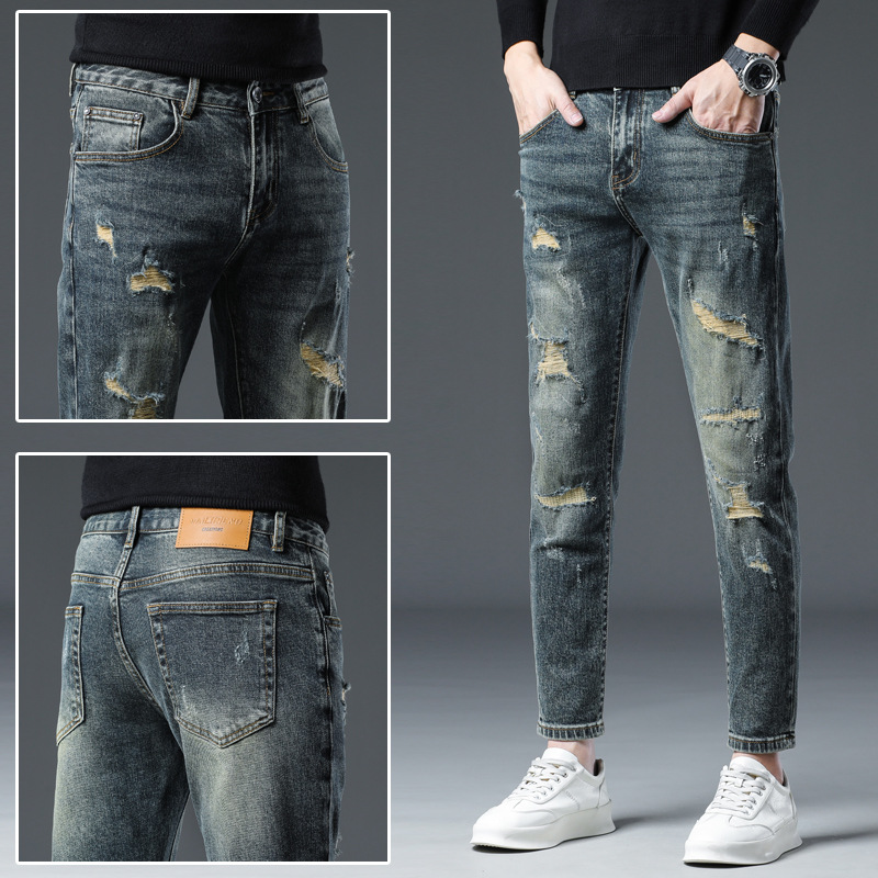 新塘秋冬新款破洞贴布水洗牛仔裤男潮流修身小脚潮男时髦长裤子男