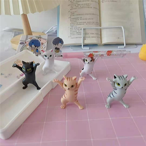 Cartoon cute kitten with enchanting dancing posture. Desktop objects to hold up and display. Pen holder objects to hold up and place for decoration.