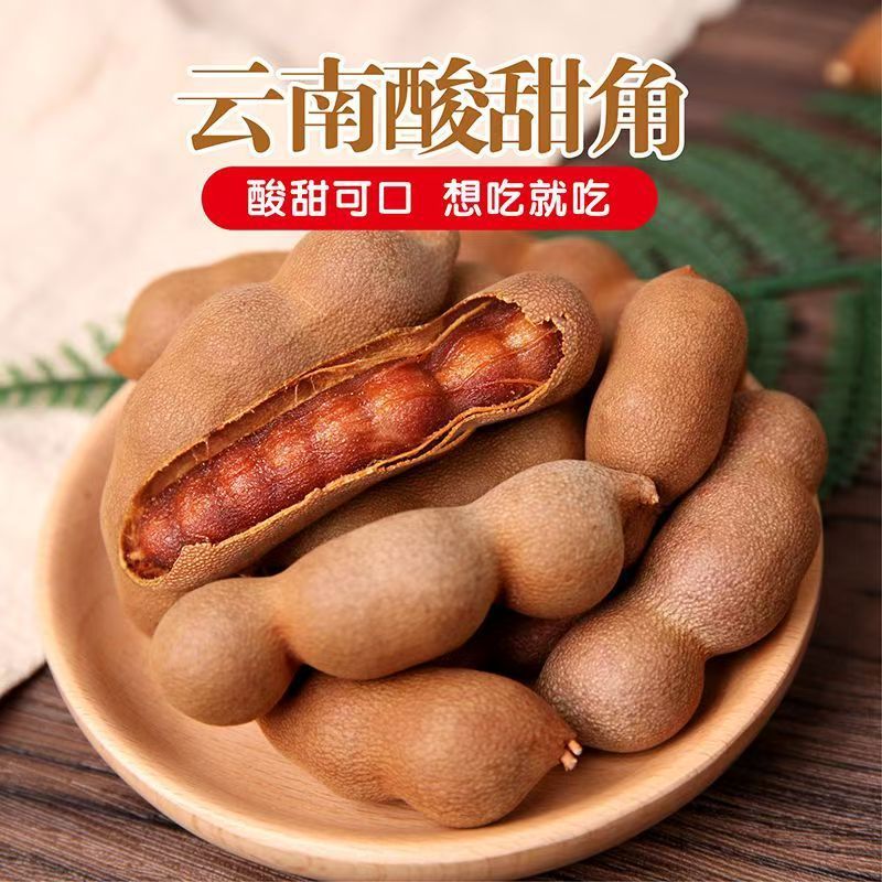 雲南名物の甘酸っぱいタマリンド、妊婦向けの新鮮な野生のタマリンドスナック、甘いタマリンド、殻付きタマリンド|undefined