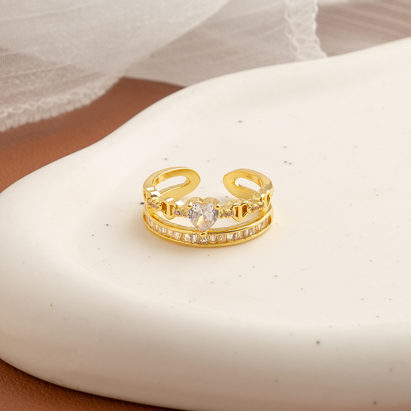 Golden ring with stone with zircon