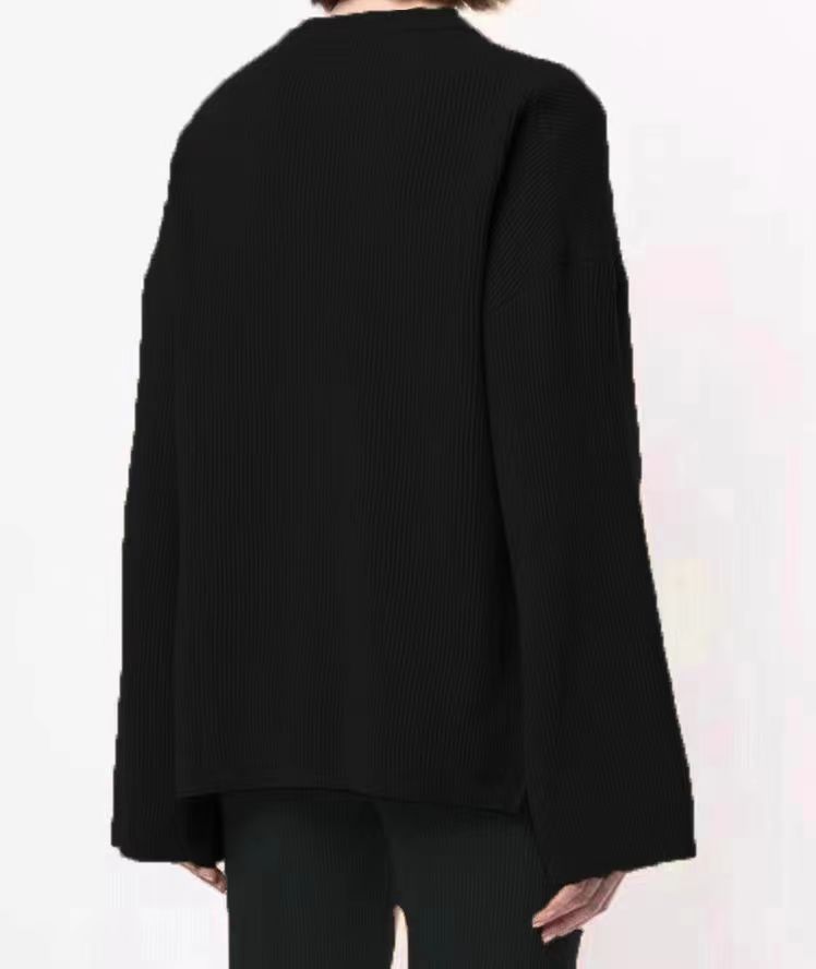 Women's all-in-one solid color three-button long sleeve loose side slit knit sweater_voghion.com