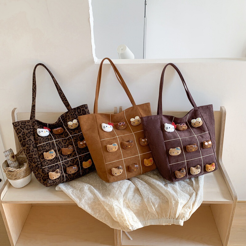 Korean-style leopard print commuter bag, casual tote bag with a unique design, versatile, large capacity, high-end feel, niche shoulder bag Korean-style leopard print commuter bag, casual tote bag with a unique design, versatile, large capacity, high-end feel, niche shoulder bag