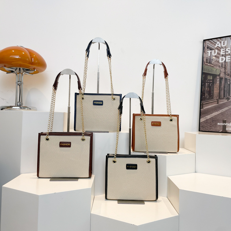 2025 primavera nueva moda temperamento bolso de alta capacidad bolso de brazo simple bolso de nicho bolso de hombro