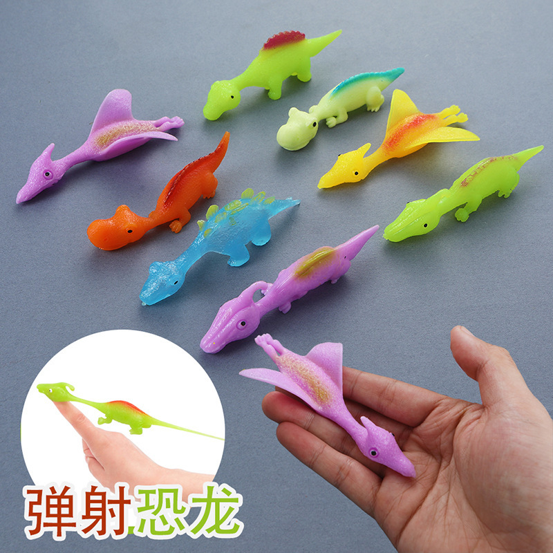 Juguete de descompresión de Catapulta de dedo de dinosaurio creativo TPR Catapulta de dedo de goma suave para niños nuevo juguete exótico