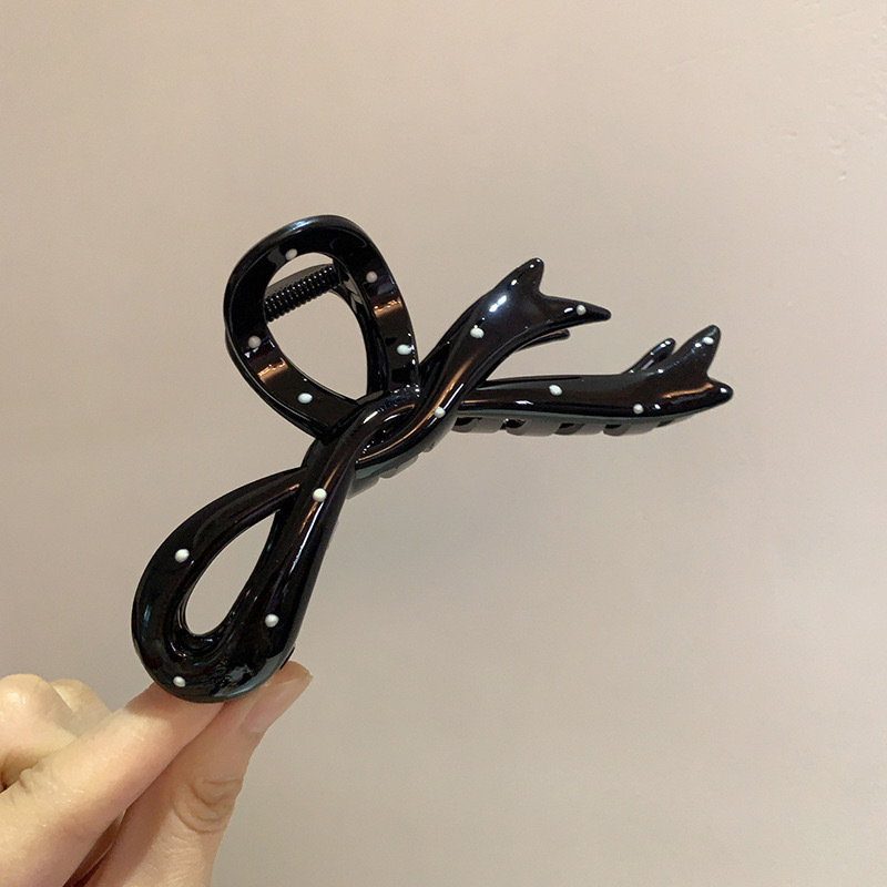 フランスのシンプルな白黒の波点は高級感の大きいサイズの新型のヘアピンを挟みます。|undefined