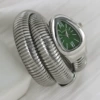 Silver, green dial