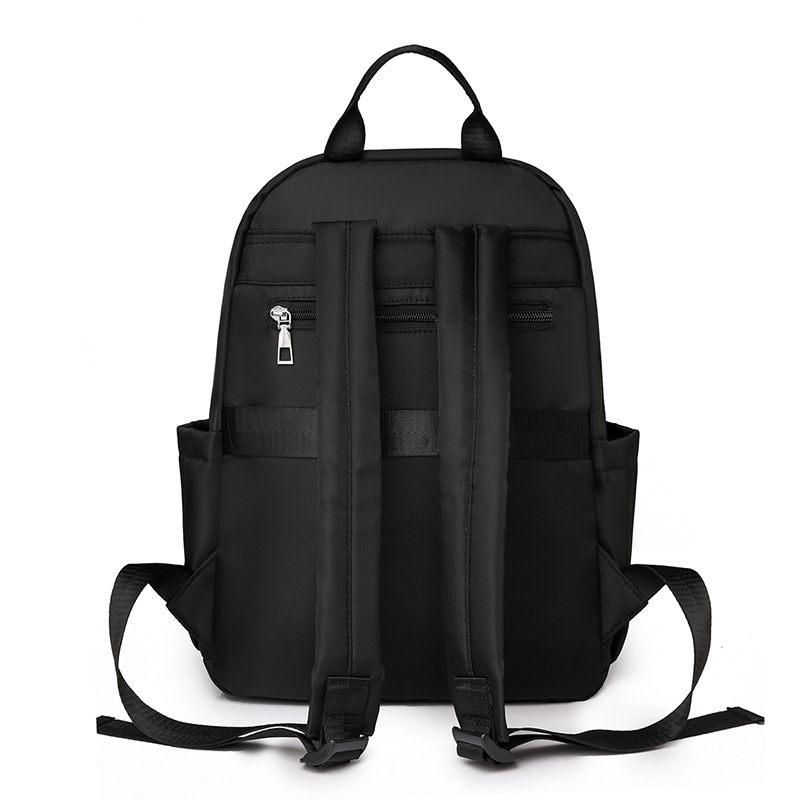 2024 verano nuevo estilo casual damas mochila de nailon simple y versátil mochila de computadora de gran capacidad para estudiantes al por mayor