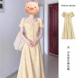法式泡泡袖黄色连衣裙夏季2026年女新款小个子绝美气质碎花长裙子