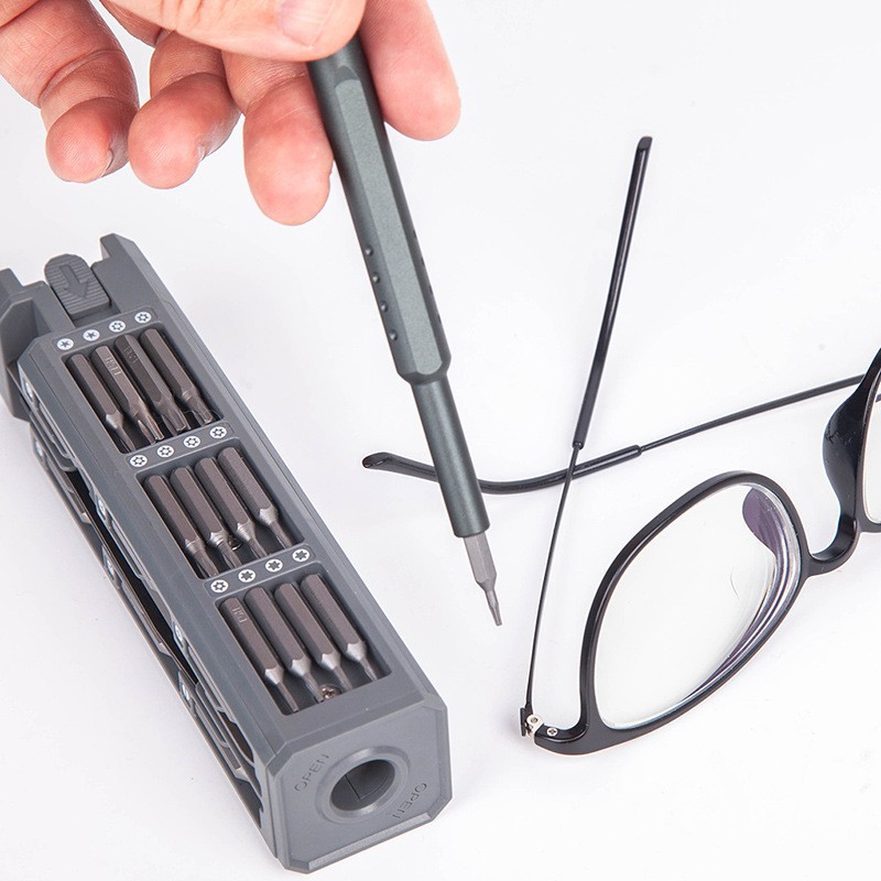 Herramienta de destornillador de desmontaje de traje de destornillador de precisión 44 en uno para la máquina de juego portátil de teléfono móvil Apple Android