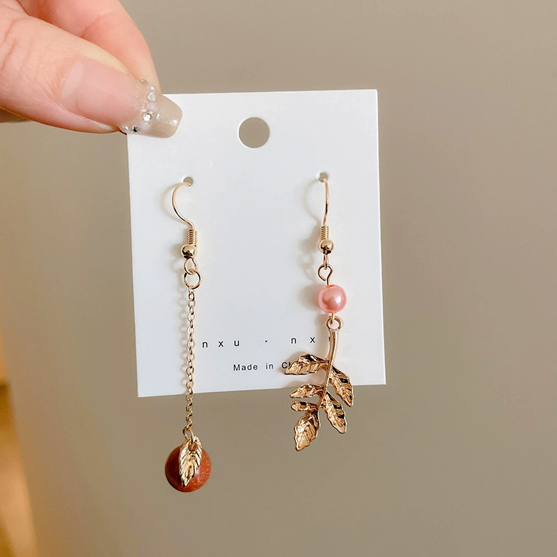 Pearl earrings, small elegant studs, light‑luxury minimalist style
