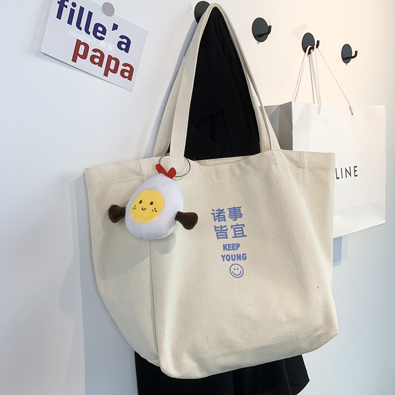 Bolso de viaje de gran capacidad, bolso de lona de un solo hombro para mujer, nuevo modelo de verano para estudiantes, bolso de mano literario ins.