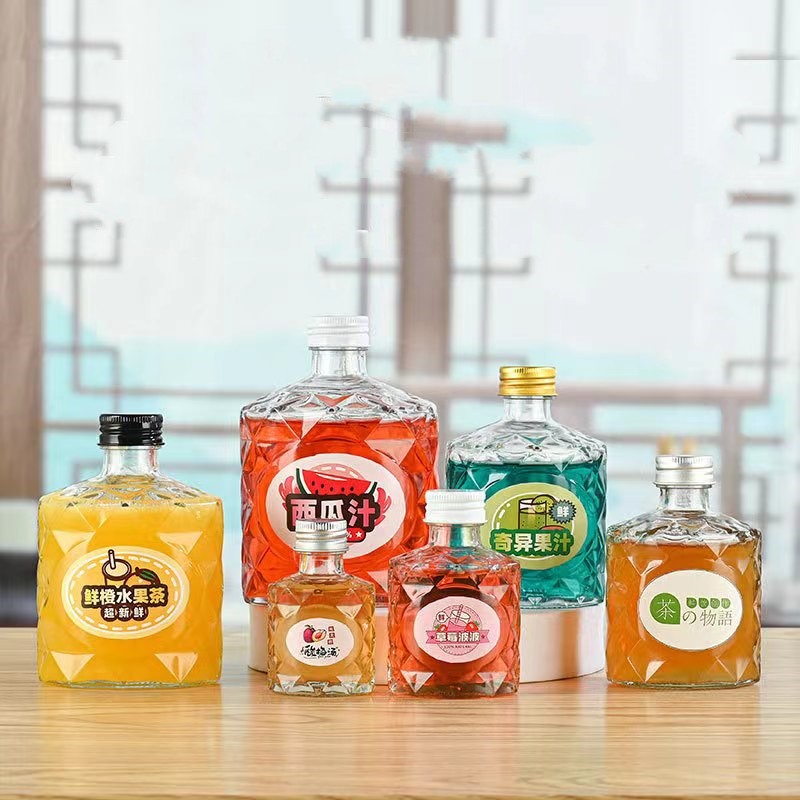 厂家批发椭圆钻石果酒瓶饮料瓶酒密封果汁奶茶玻璃瓶新款菱形透明