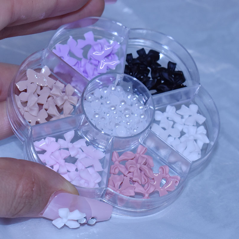 Venta caliente transfronteriza cinta de arco de uñas perla diamante Aurora oso 7 rejilla tocadiscos joyería de uñas al por mayor