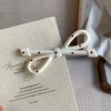 With bow, white