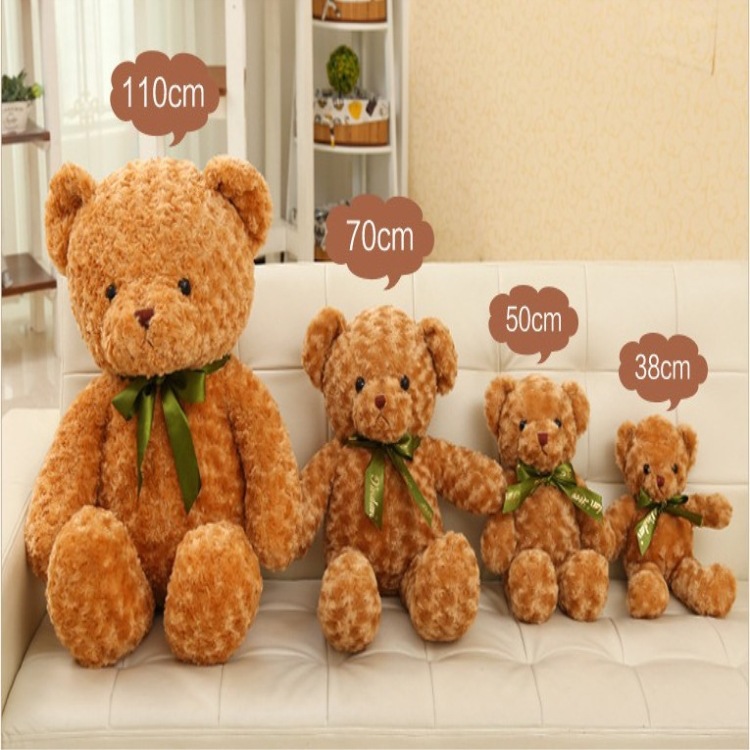 Nueva cinta de peluche de juguete de peluche oso muñeca abrazo oso muñeca para niñas regalo de cumpleaños una generación