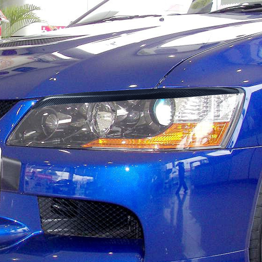 Suitable for 03-07 Mitsubishi EVO7-9 generation carbon fiber modified lamp eyebrow headlight decorative strip lamp eyebrow patch