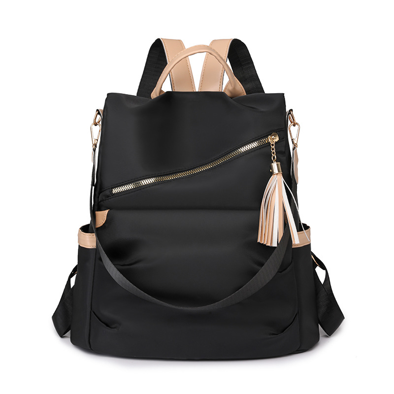 Spot al por mayor 2025 nueva mochila antirrobo casual para mujer moda borla mochila para mujer de gran capacidad marea