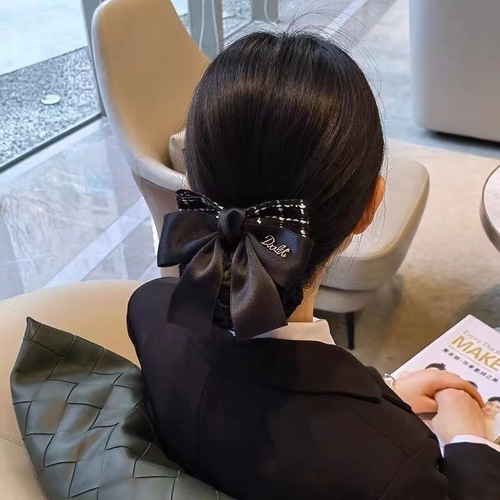Hair accessories for flight attendants, nurses, and hotel staff, including high-end hair nets and decorative hairpins.