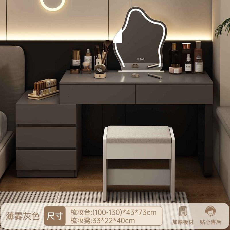 Wardrobe de madera maciza de tabla de roca dormitorio moderno simple pequeño tipo de lujo ligero de alta sensación armario de maquillaje en casa