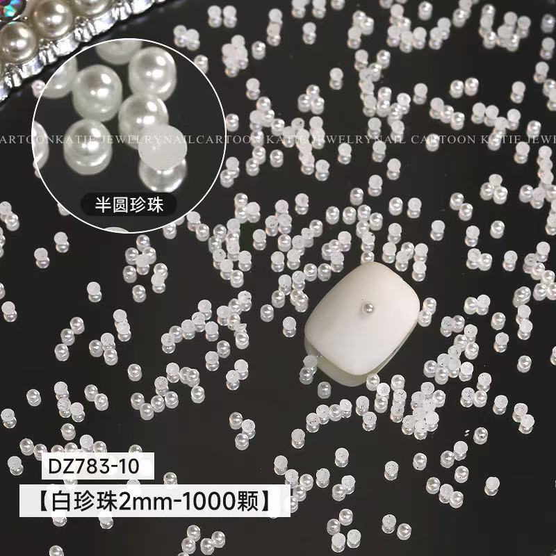 Joyas de manicura de perlas blancas puras no se desprenden de la piel de la bolsa plana de fondo redondo medio redondo de perlas brillantes de uñas especiales