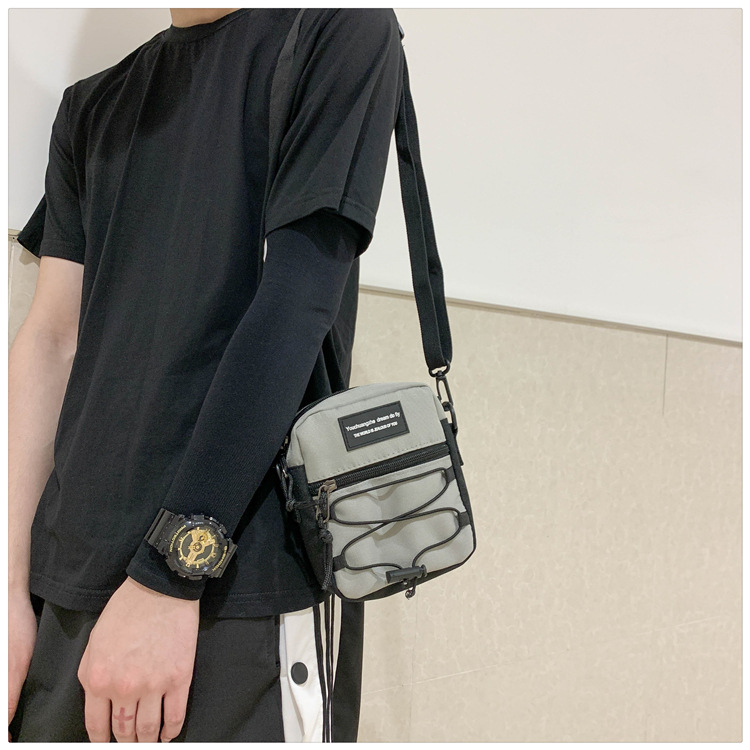 67g Weight Zipper Closure Type Single Shoulder Strap Strap Type Crossbody Bag Bags Type Nylon Material Letter Pattern Streetwear Style Square Shape Khaki, Light Grey, White, Black Color Small Size Small Nylon Letter Streetwear Square Zipper Crossbody Bag 21