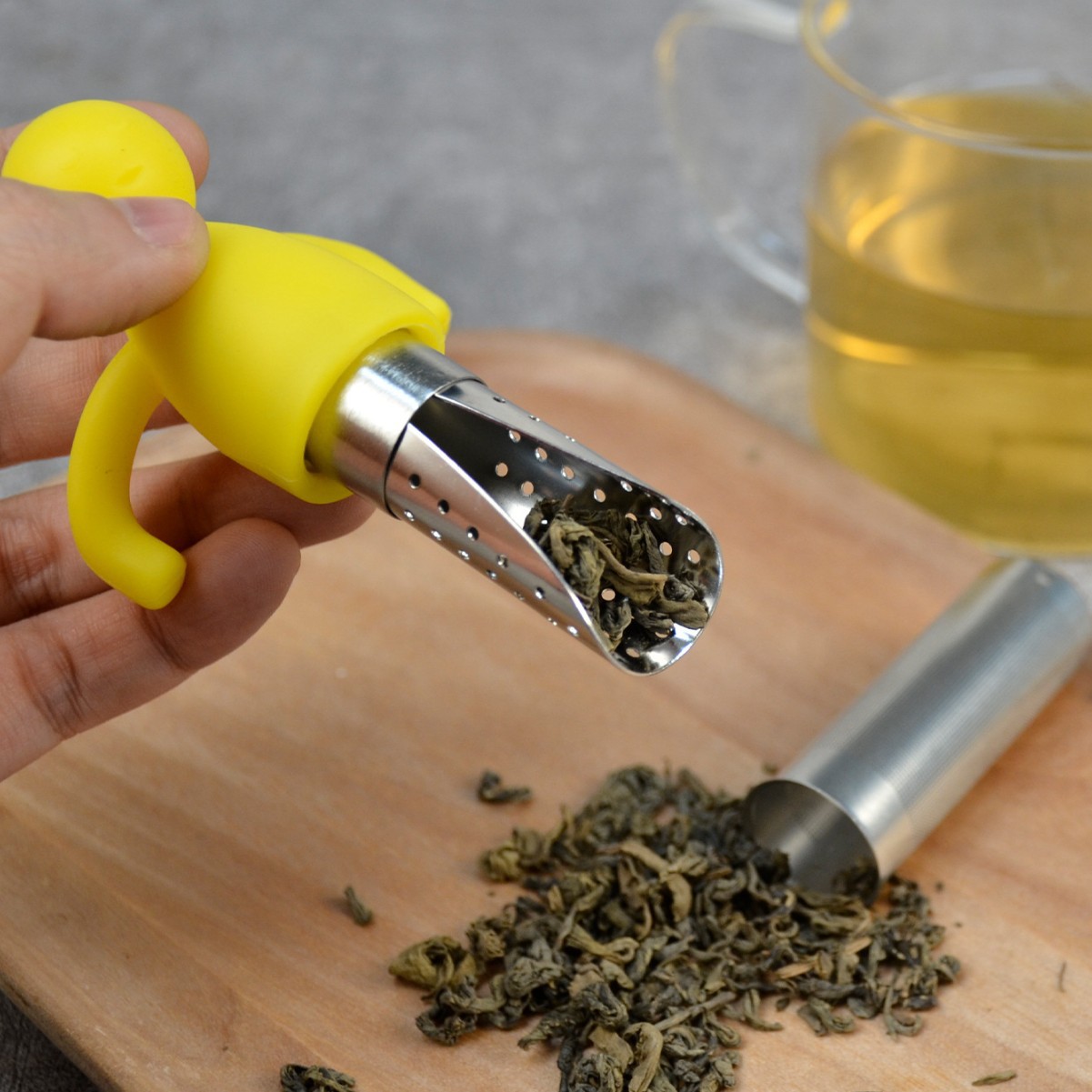 Colador de té creativo de acero inoxidable con cuchara de té colgando portátil de silicona en forma humana fabricante de té al por mayor lindo Filtro de té