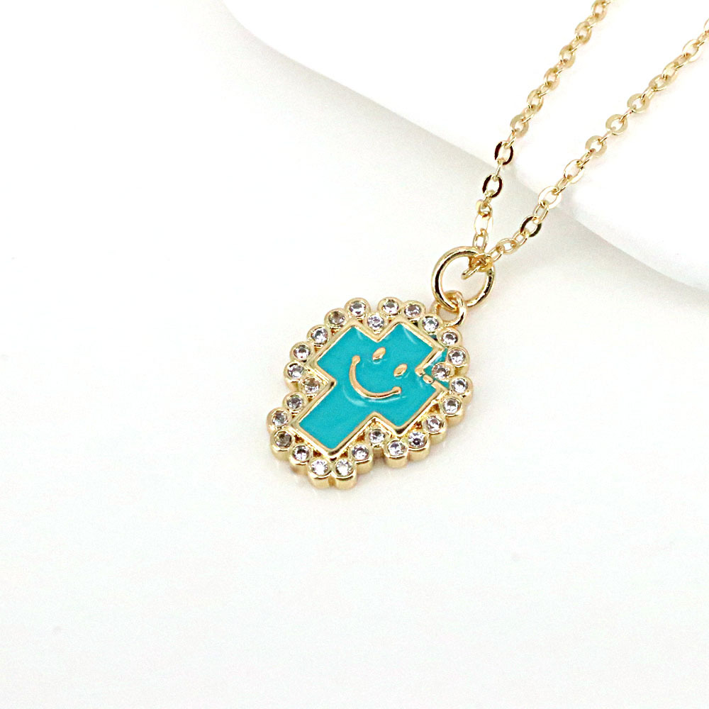 simple goldplated microinlaid zircon cross smiley face expression drip oil necklacepicture5