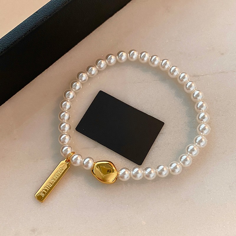 Golden white bracelet