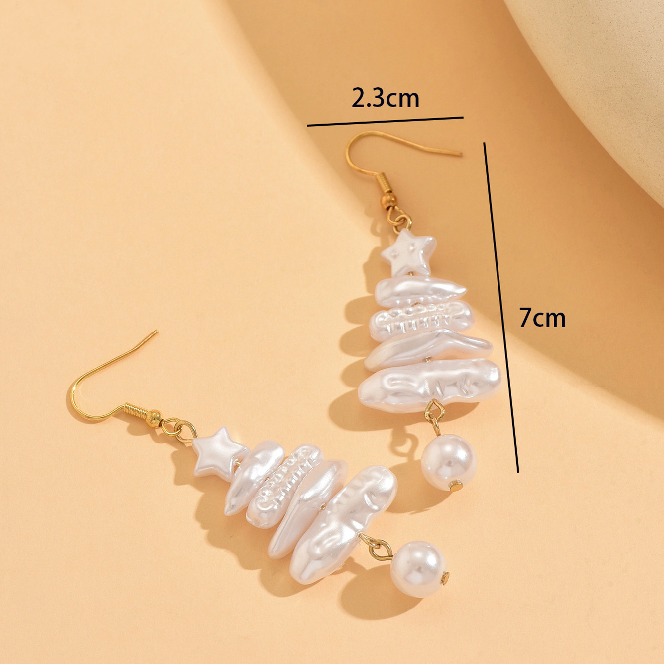 Orecchini pendenti con perle barocche e stelle gioielli donna_voghion.com