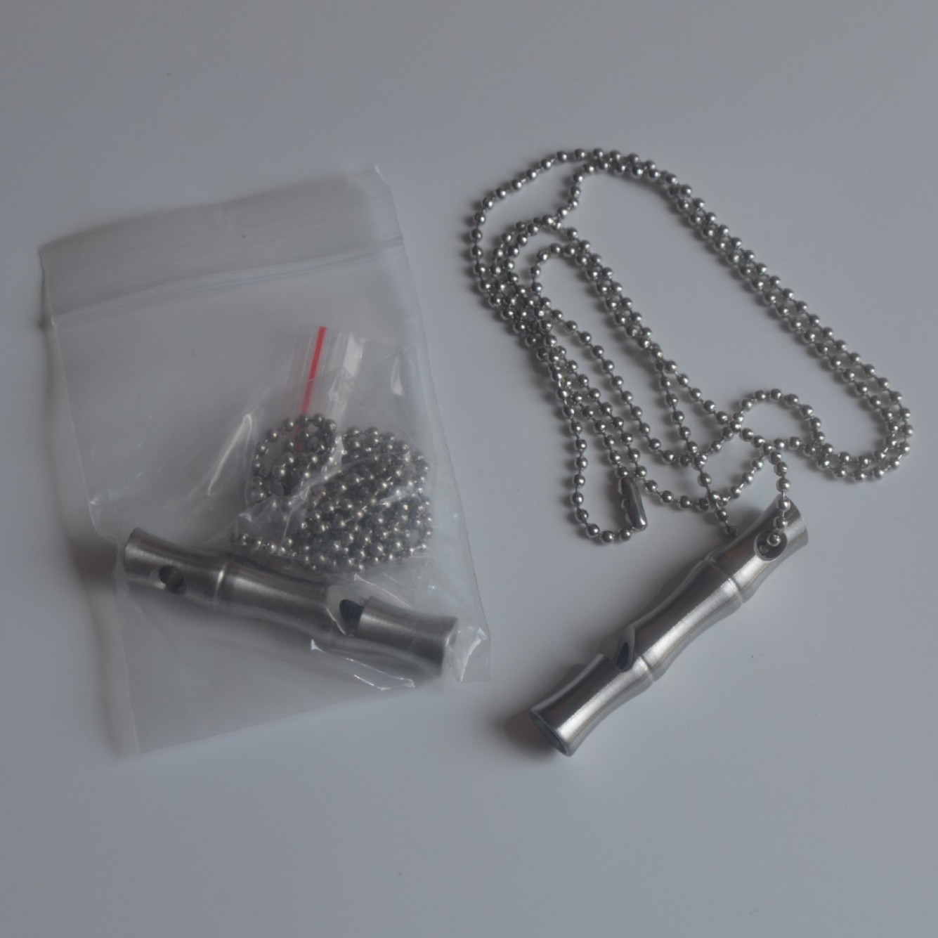 Stainless steel bamboo whistle outdoor camping survival whistle high-decibel metal whistle emergency survival whistle rescue whistle