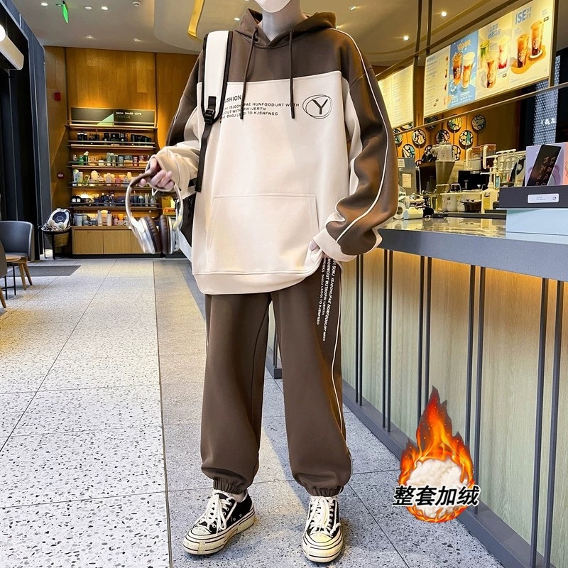 Otoño y invierno de hombre suelto encapuchado juego deportivo casual juvenil hombre con camiseta gruesa de dos piezas