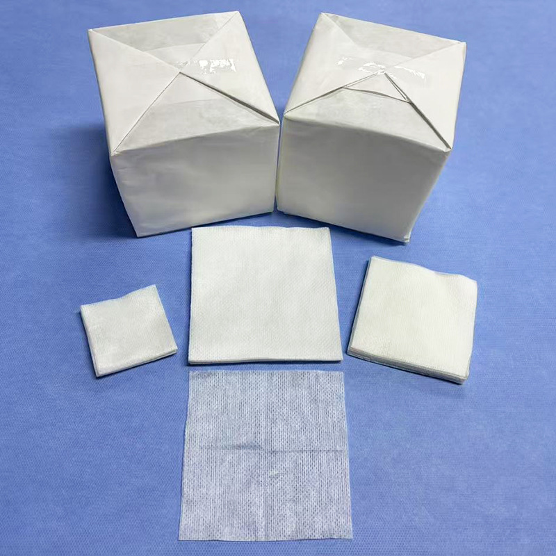 厂家直供2×2英寸5×5cm水刺网孔无纺布片一次性牙科无纺布
