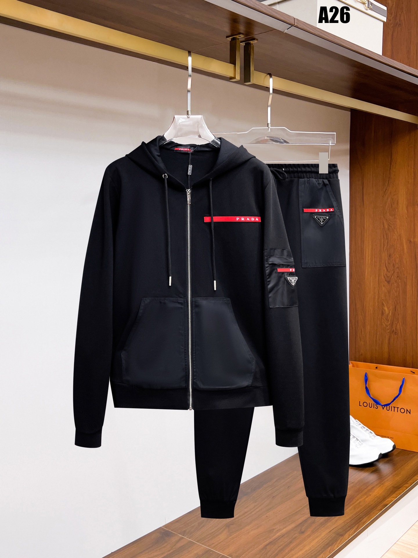 25 años de otoño y invierno de alta calidad nuevo estilo P casa marca de moda cardigan casual suéter deportivo conjunto de parejas
