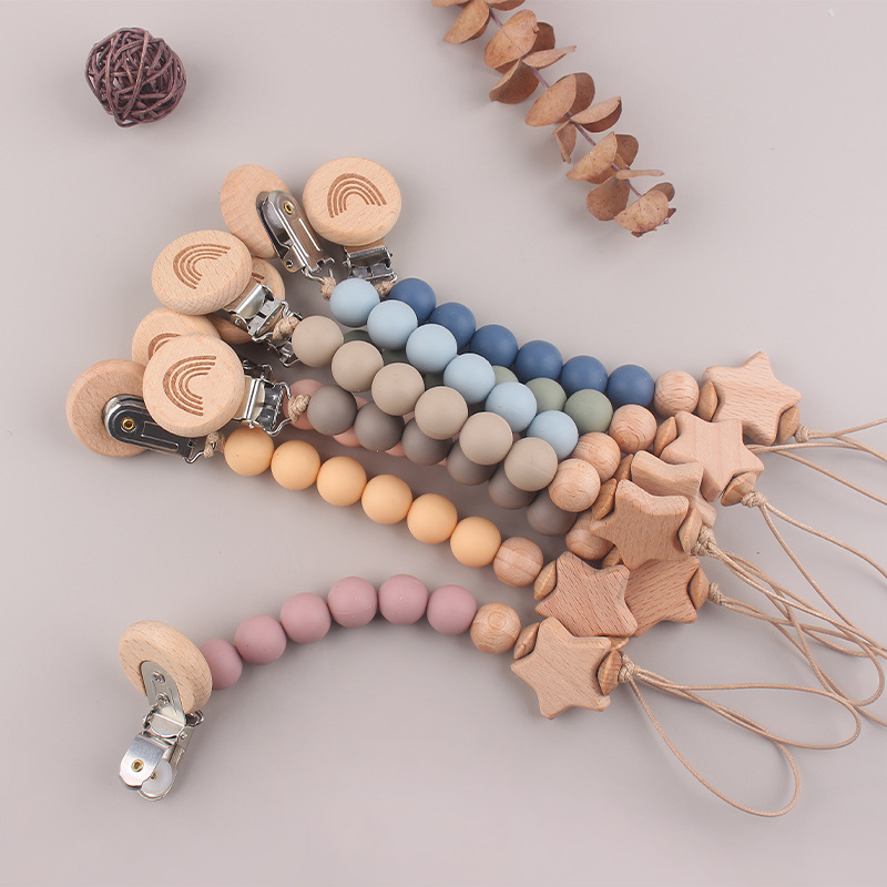 Productos para bebés y niños pequeños clip de tetina de beech DIY estrella de penta de beech creativa perlas de silicona calmante tetina cadena anti-caída cadena
