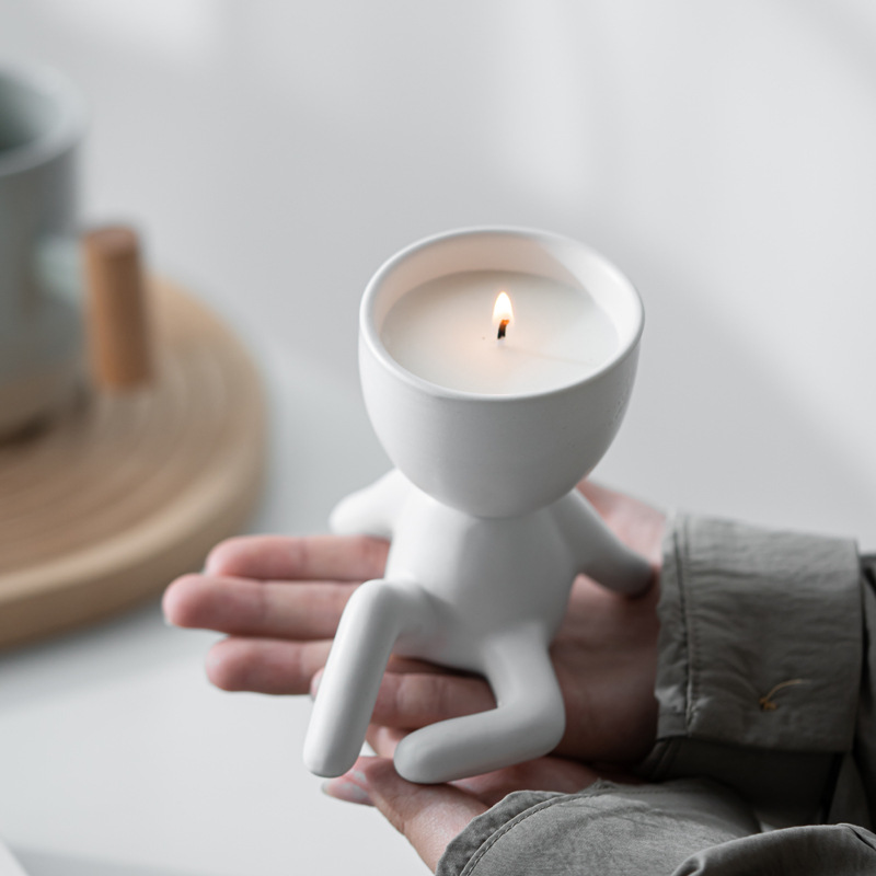 Modern creative ceramic candle holder seated little figure aromatherapy candle desktop decoration atmosphere ornament photography prop wholesale