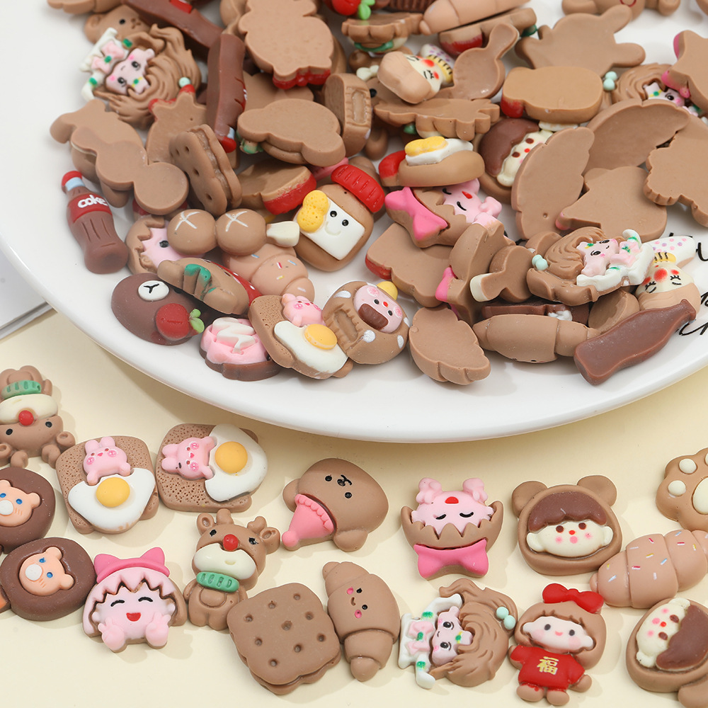 Color de dibujos animados mezclado accesorios de resina al azar diy crema pegamento horquilla accesorios para el cabello accesorios hechos a mano material al por mayor