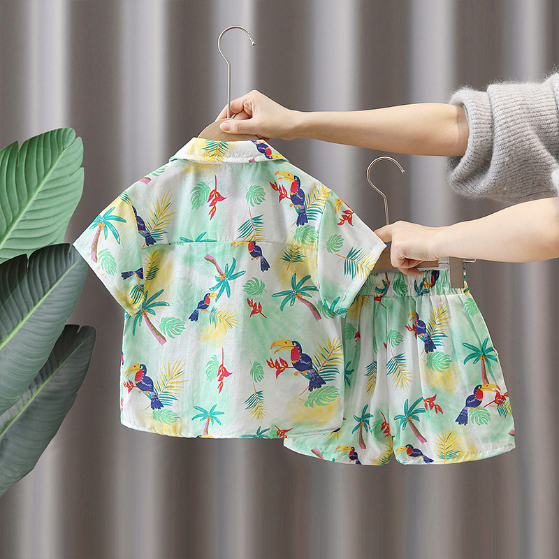 7115 Traje de verano para niños Camisa de estilo de playa de manga corta para niños 2025 Nuevo traje de dos piezas de viaje de verano para niños