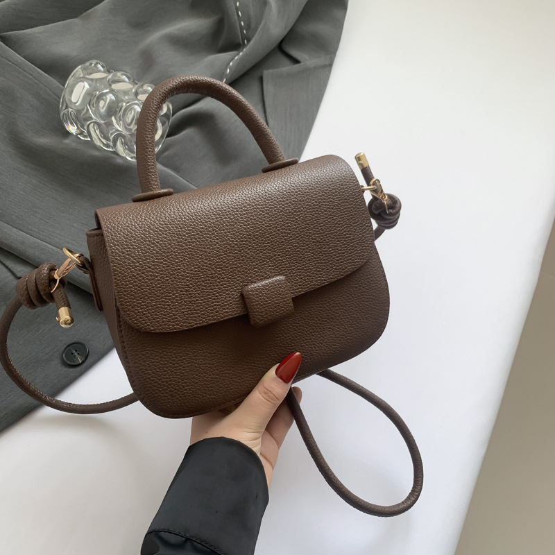 荔枝紋法式個性潮通勤包包女2024新款韓版時尚單肩斜挎手提馬鞍包