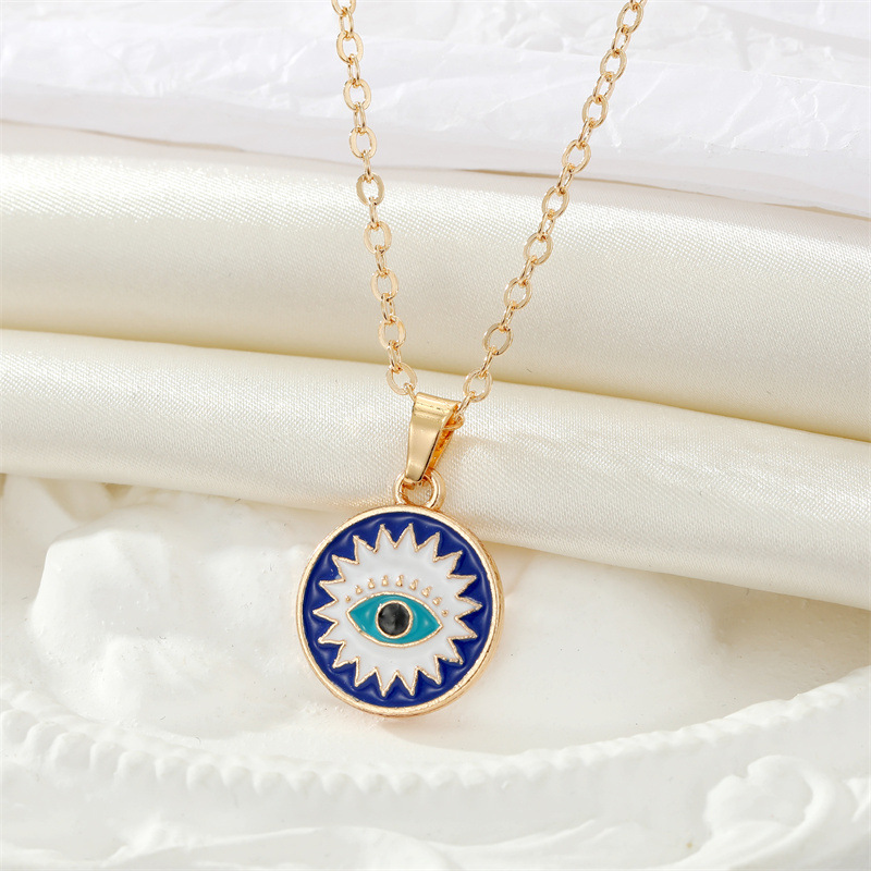retro ethnic color drop oil Turkish devil eye palm pendant metal necklace