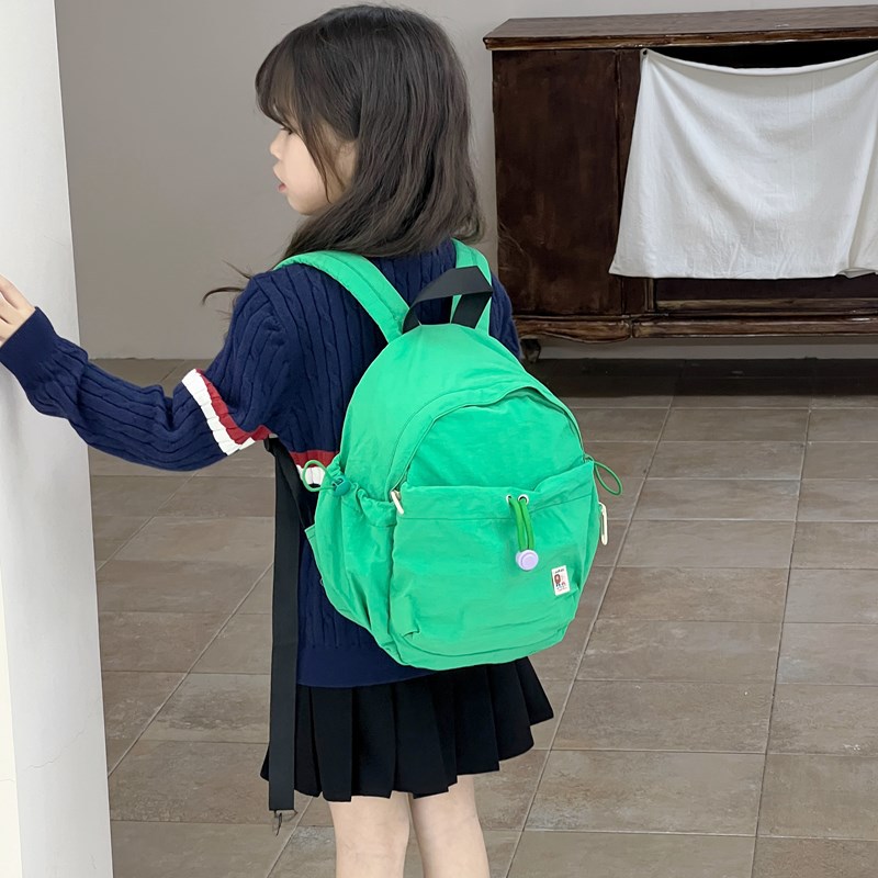 Coreana pequeña mochila fresca para niños y niñas, color macarón jardín de infantes, mochila para bebés, mochila de cuerda sólida para niños