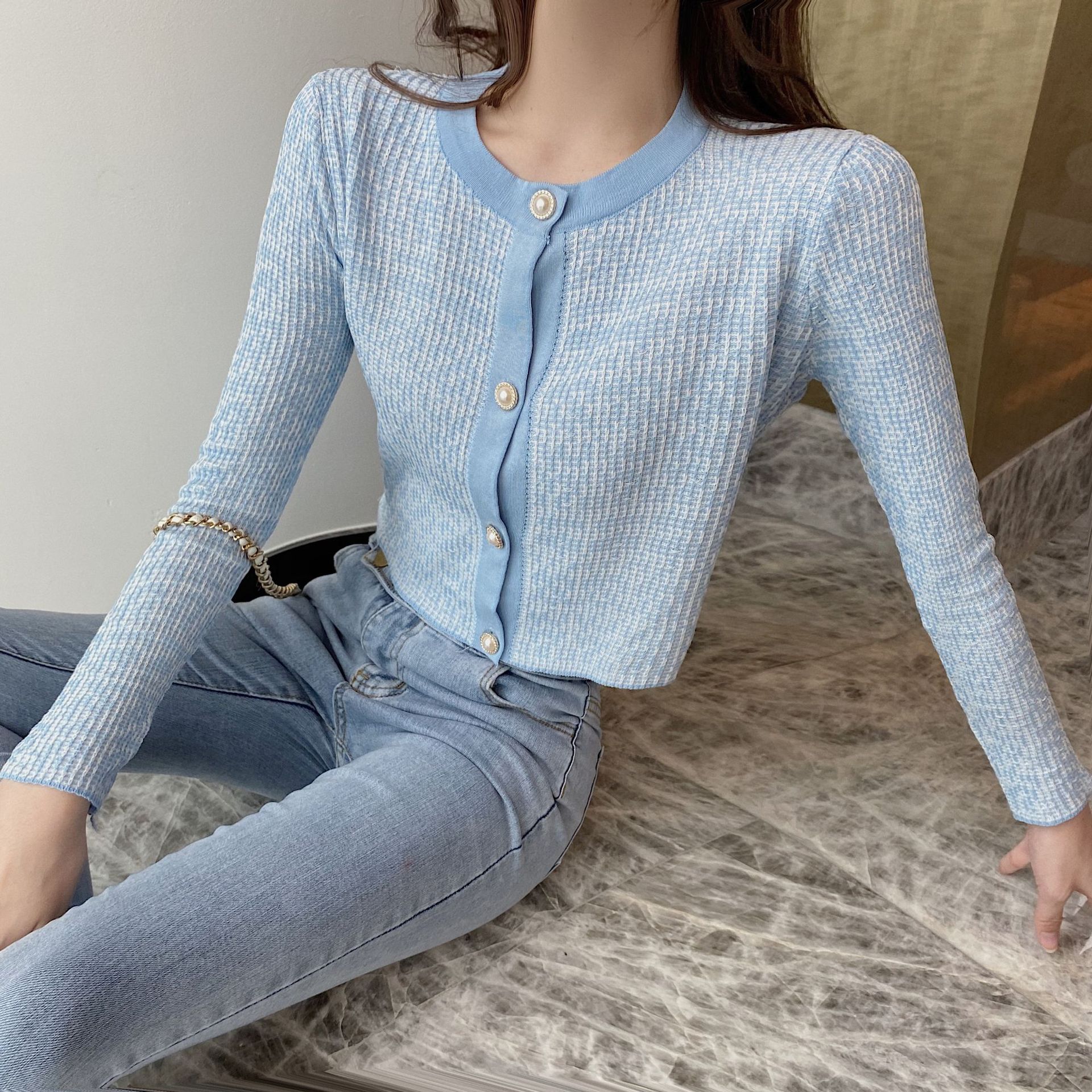 Cardigan with a round collar