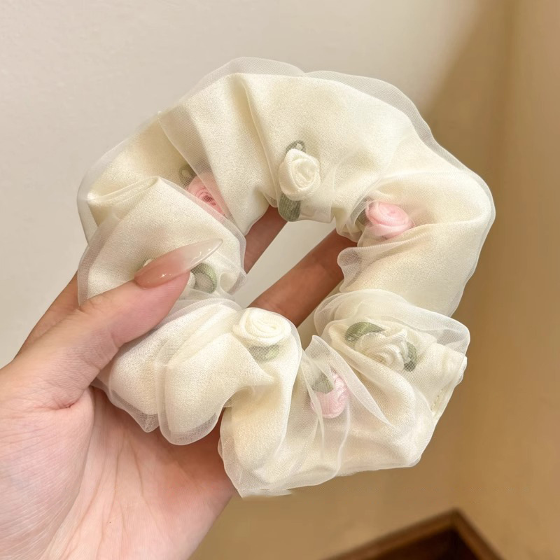 Pastoral viento intestino anillo de cabello mujer 2025 nuevo estilo de alta sensación bola de cabello cuerda de cabeza flor dulce princesa adornos de cabello cuerda